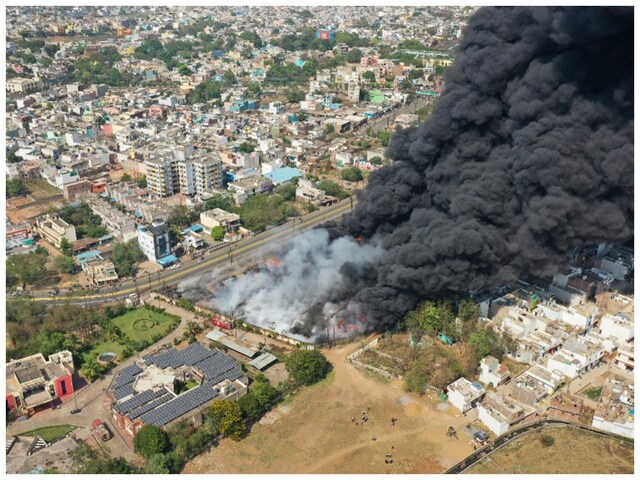Dense smoke rises after a massive fire broke at a factory, in Raipur.
(Image: PTI)