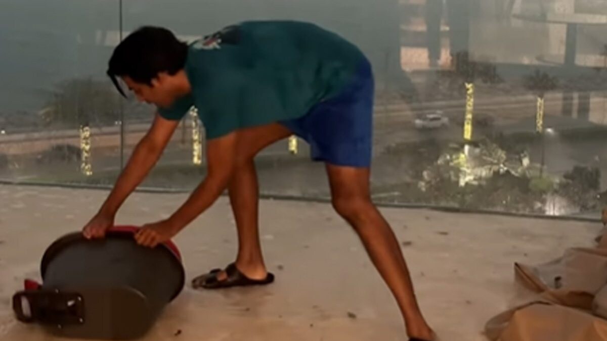 Watch: Indian Entrepreneur Juggles Between Flooded Balcony And Zoom Meetings During Dubai Rains - Vimarsana News