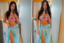 Actress Malavika Mohanan Oozes Oomph In Bikini And Sarong