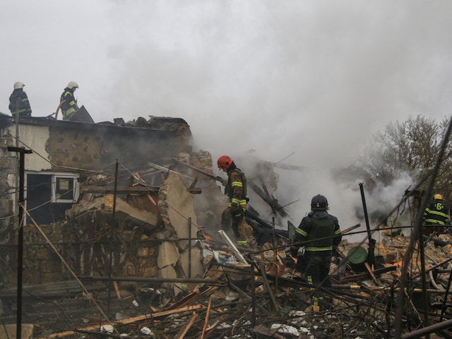 Firefighters work at the site where residential buildings were damaged by a Russian missile strike, amid Russia's attack on Ukraine, in Odesa, Ukraine April 20, 2024. (Reuters)
