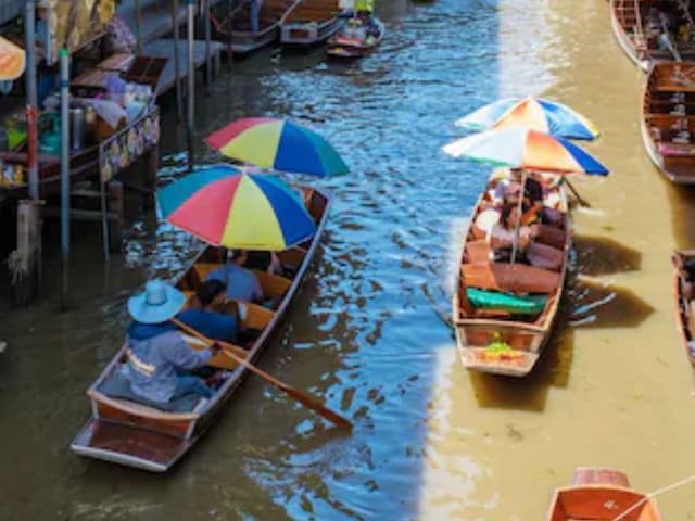 A floating market is where goods are sold on boats.