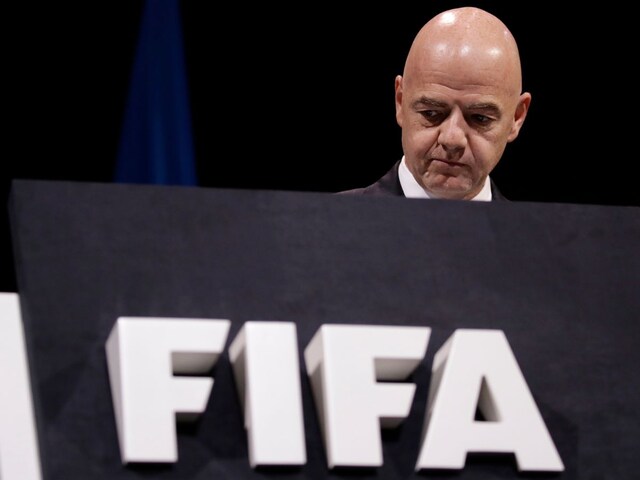 FILE -FIFA President Gianni Infantino walks on the stage before the start of the 69th FIFA congress in Paris, Wednesday, June 5, 2019. FIFA has been told to reschedule its inaugural expanded Club World Cup just over a year before the tournament is due to be hosted by America. (AP Photo/Alessandra Tarantino, File)