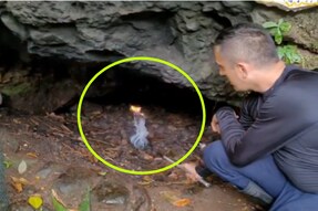 An explorer shows how a torch extinguishes inside Costa Rica’s Cave Of Death due to the presence of a toxic gas. (Image: @Rainmaker1973/X)