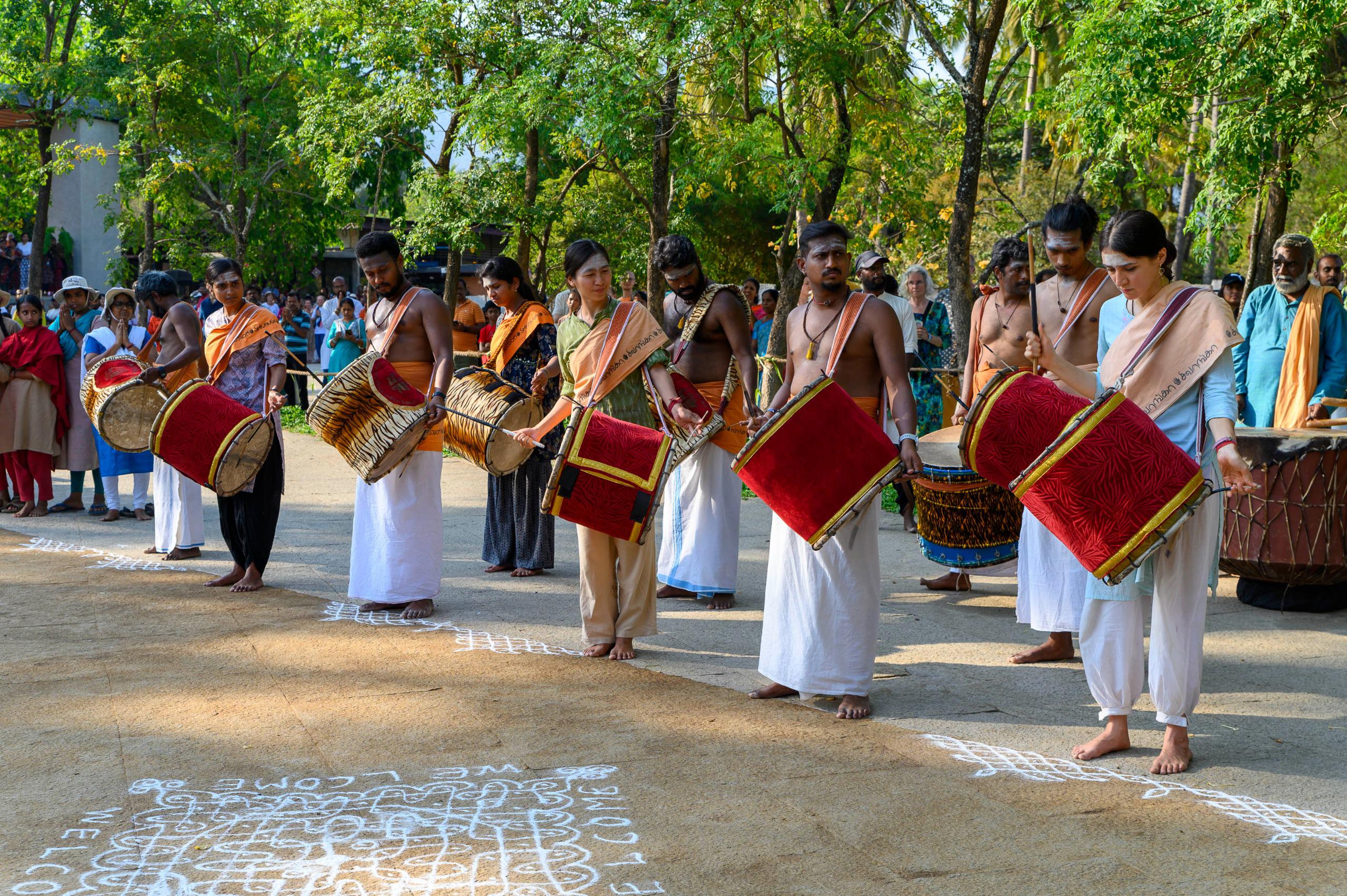 Marching To Her Own Beat: Meet First Foreign Woman Drummer Offering Kailaya Vathiyam At Tamil Marching To Her Own Beat: Meet First Foreign Woman Drummer Offering Kailaya Vathiyam At Tamil