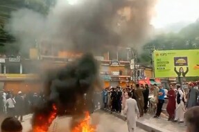 Protesters burn tyres demanding lesser taxes and subsidies in Pakistan-occupied Kashmir. (Image: X/@KASHMICO)