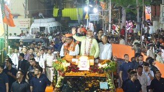 PM Modi during his Patna roadkshow. (News18) PM Modi during his Patna roadkshow. (News18)