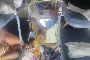 Child Sleeps on Makeshift Hammock on Ajmer-Mysuru Train