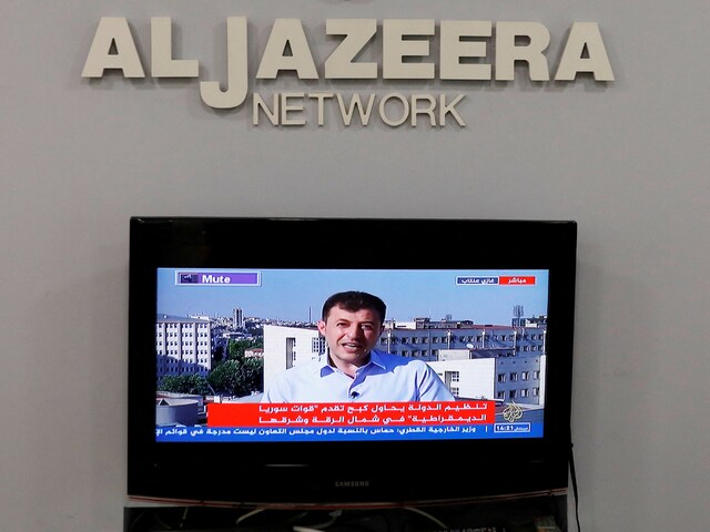 The logo of Qatar-based Al-Jazeera network is seen in one of their offices in Jerusalem June 13, 2017. Picture taken June 13, 2017. (Reuters/File Photo)
