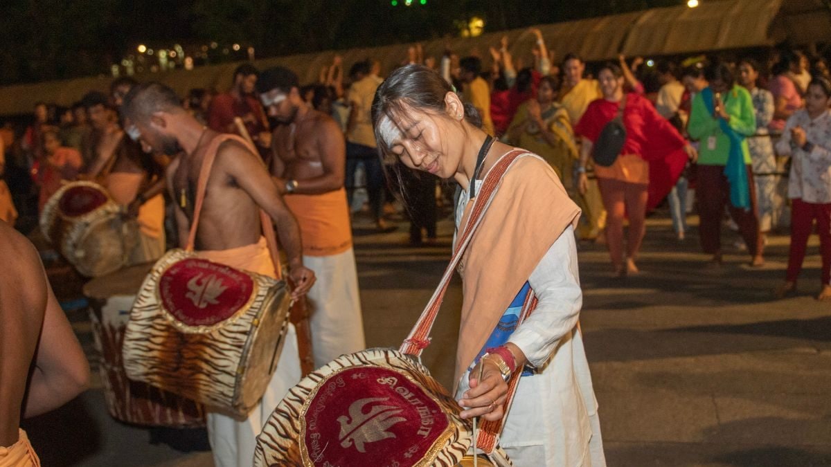 Marching To Her Own Beat: Meet First Foreign Woman Drummer Offering Kailaya Vathiyam At Tamil Marching To Her Own Beat: Meet First Foreign Woman Drummer Offering Kailaya Vathiyam At Tamil
