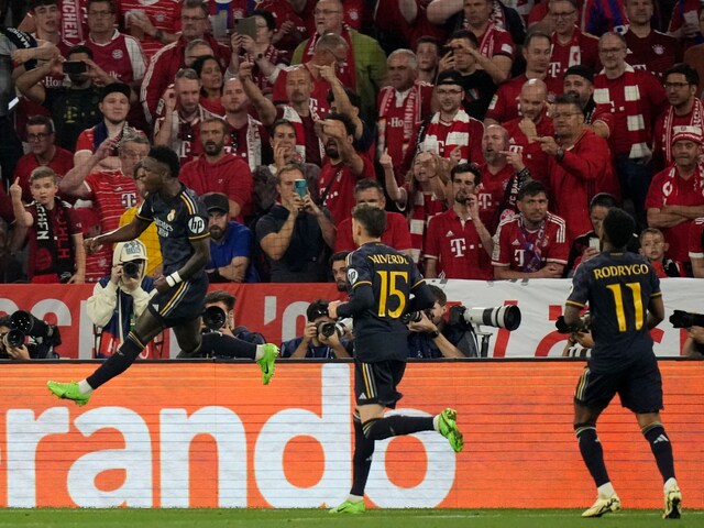 Vinicius Junior (left) celebrates after scoring his side's second goal. (AP Photo)