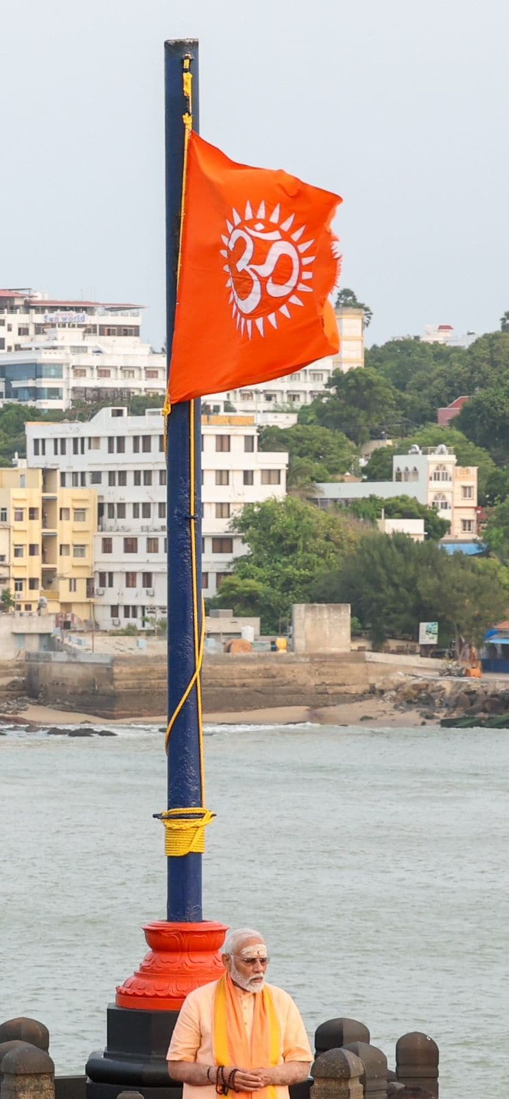 Modi walked around the mandapam with his 'japa mala' in his hands. Modi walked around the mandapam with his 'japa mala' in his hands.
