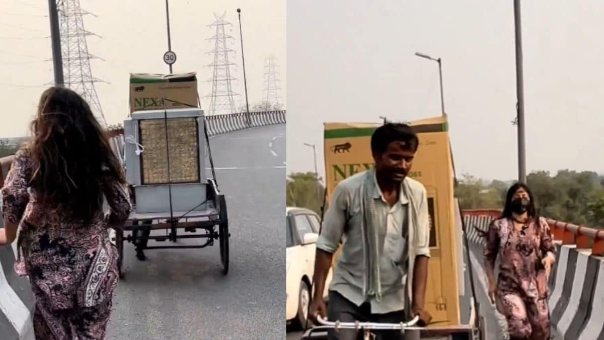 Watch: Woman Helps Rickshaw Puller Carrying Heavy Goods On Flyover, Internet Reacts