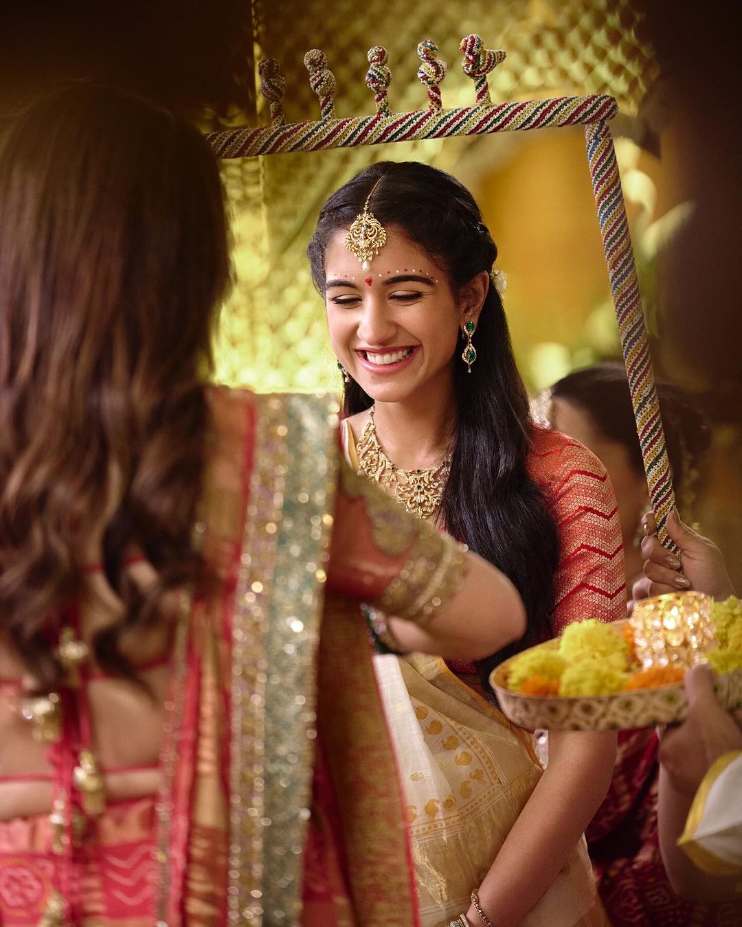 Radhika looked extremely pretty sporting chandan and tika during the Graha Shanti puja before the wedding nuptials. (Photo: Instagram/@rheakapoor) Radhika looked extremely pretty sporting chandan and tika during the Graha Shanti puja before the wedding nuptials. (Photo: Instagram/@rheakapoor)