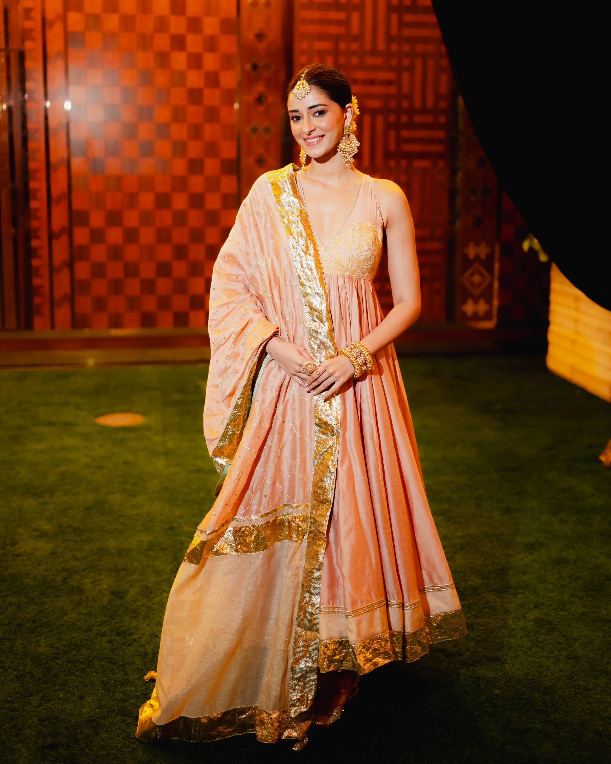 Ananya Panday was a sight for sore eyes in a custom peach-coloured anarkali suit by Re-Ceremonial. (Image: Viral Bhayani) Anant Ambani, Radhika Merchant wedding