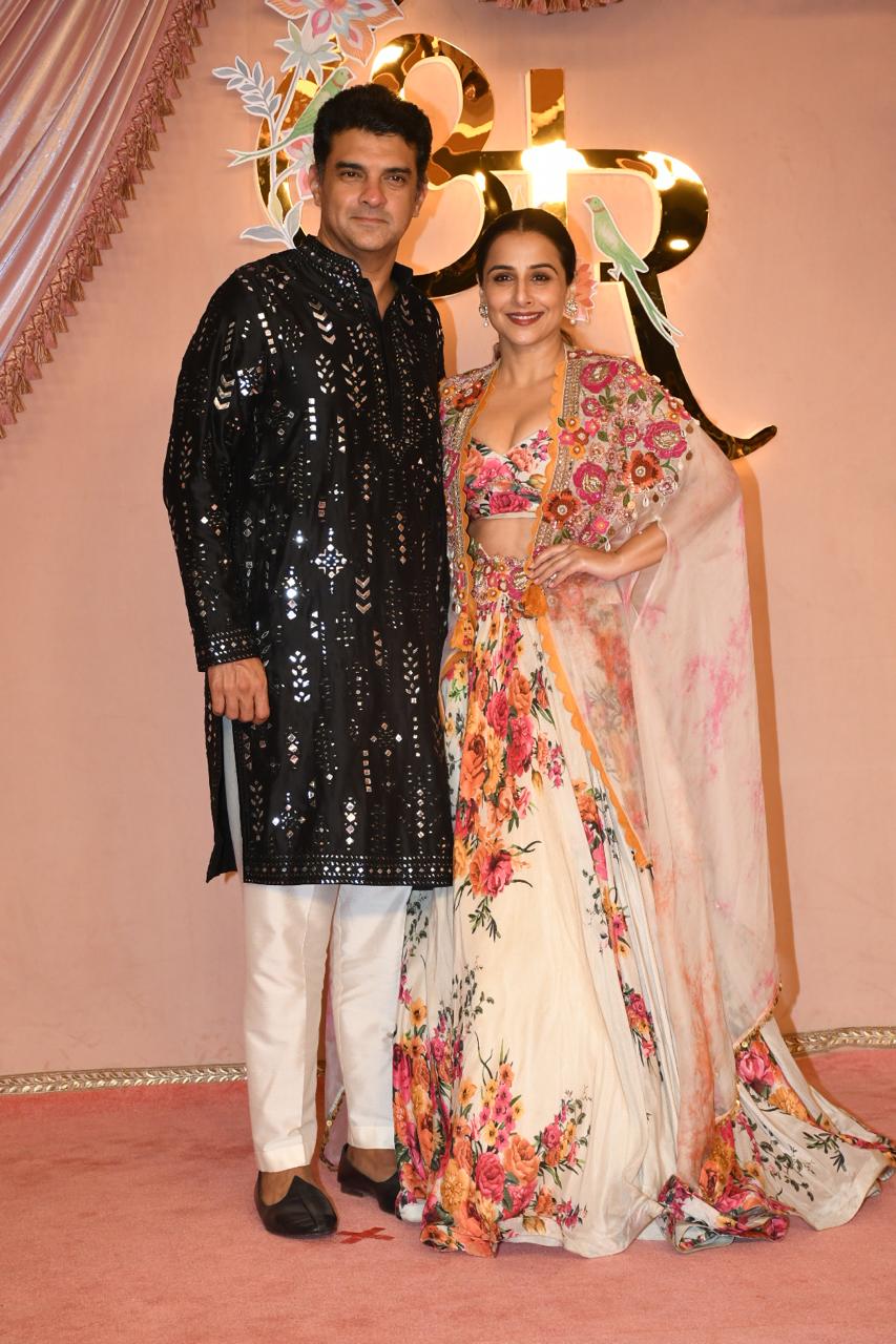 Vidya Balan was a sight for sore eyes in the floral lehenga while Siddharth Kapur looked handsome in black. (Image: Viral Bhayani) Anant Ambani Radhika Merchant sangeet