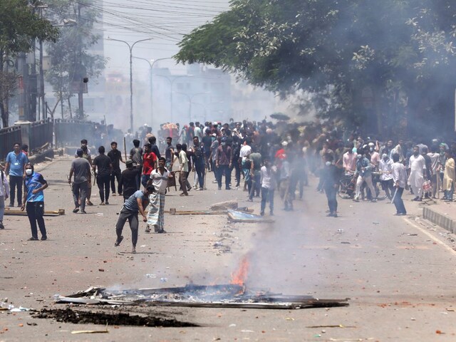 Students clash with riot police during a protest against a quota system for government jobs, in Dhaka. (File Photo/AP)