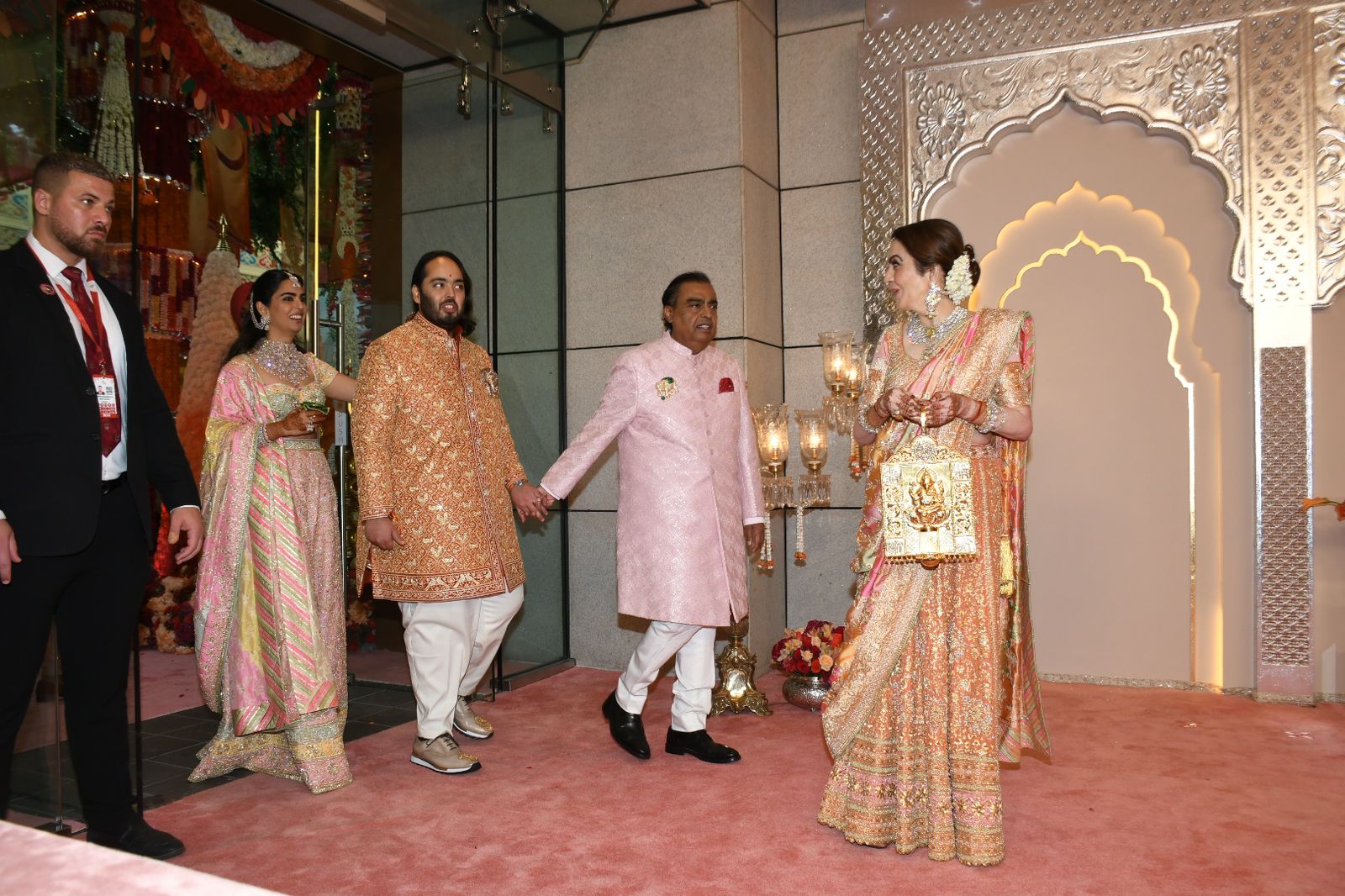 Mukesh Ambani is seen holding hands with dulhe raja Anant as they enter Bandra's Jio World Convention Centre. (Image: Viral Bhayani) Mukesh Ambani is seen holding hands with dulhe raja Anant as they enter Bandra's Jio World Convention Centre. (Image: Viral Bhayani)