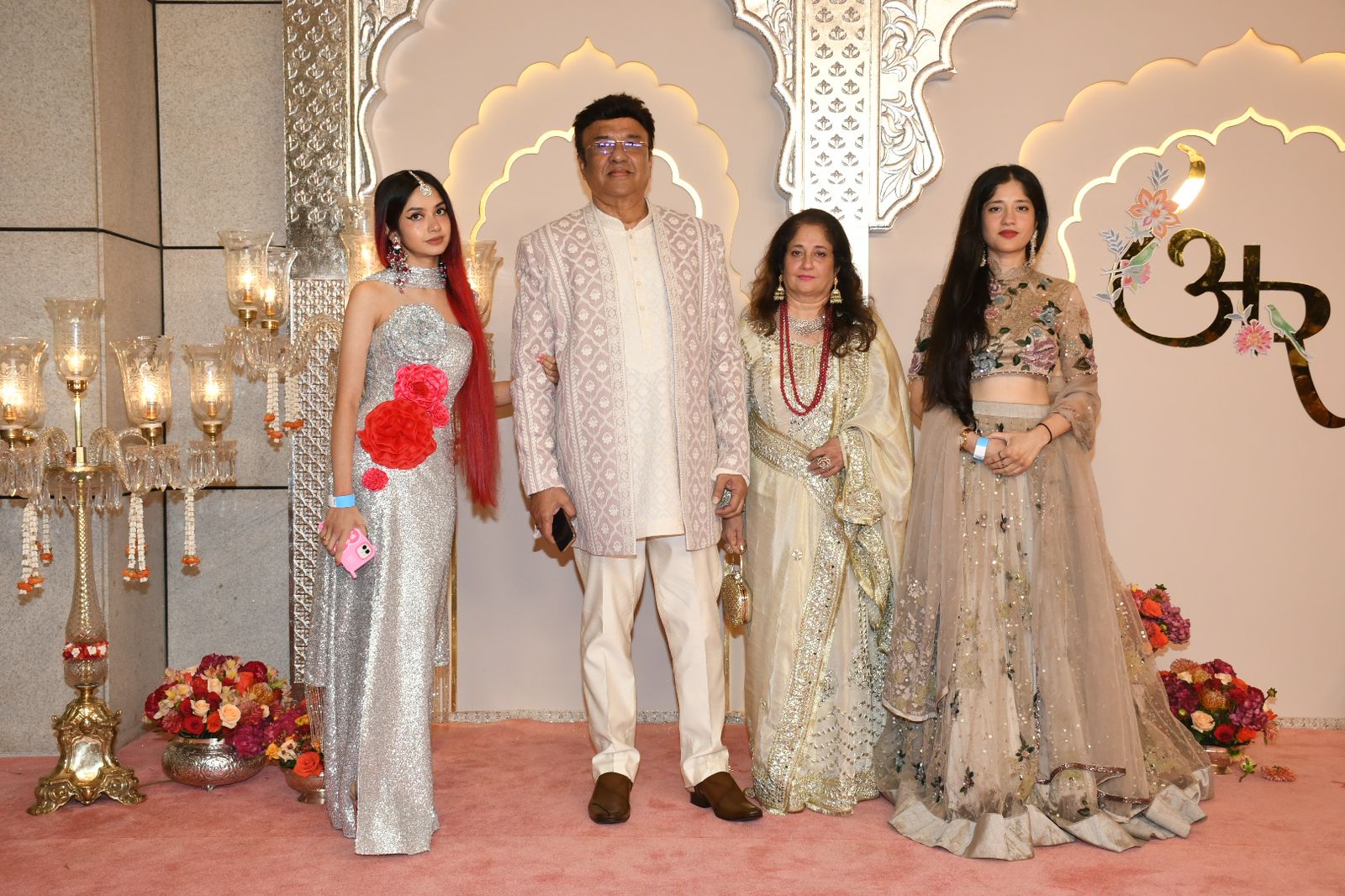 Anu Malik is a part of the celeb attendees. He poses with his wife Anjali and daughters Anmol and Ada. (Images: Viral Bhayani) Anu Malik is a part of the celeb attendees. He poses with his wife Anjali and daughters Anmol and Ada. (Images: Viral Bhayani)