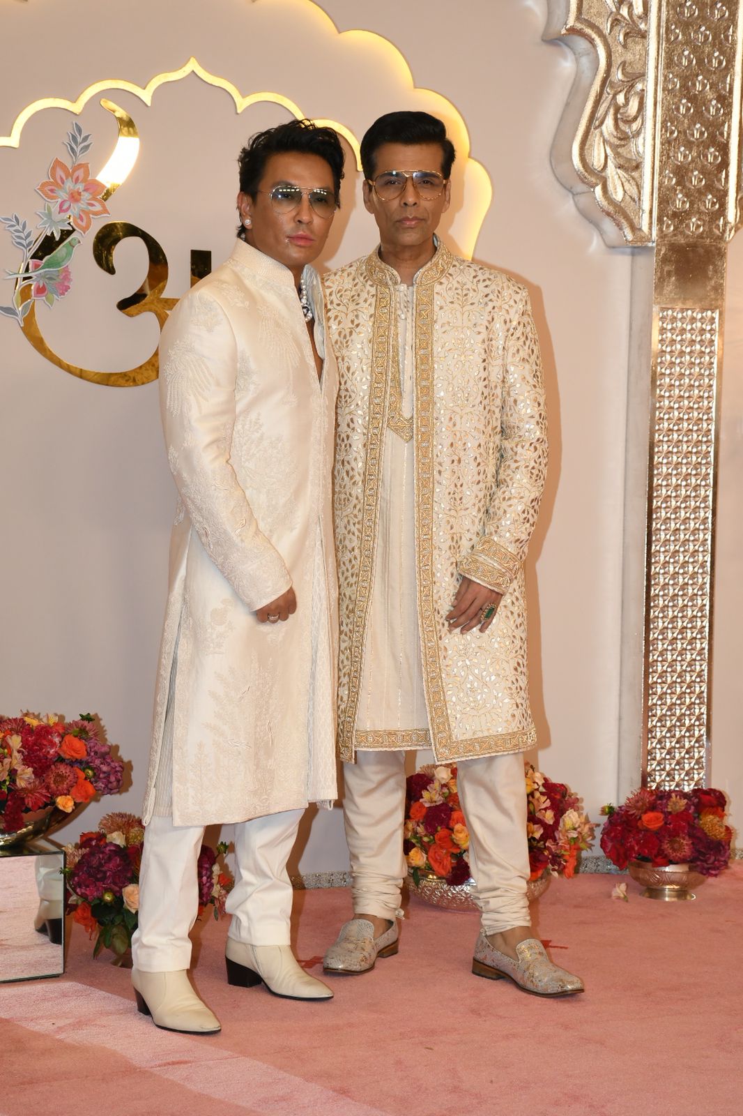 Karan Johar poses with designer Prabal Gurung as both of them look amazing in cream-coloured fits and stylish shades. (Images: Viral Bhayani) Karan Johar poses with designer Prabal Gurung as both of them look amazing in cream-coloured fits and stylish shades. (Images: Viral Bhayani)