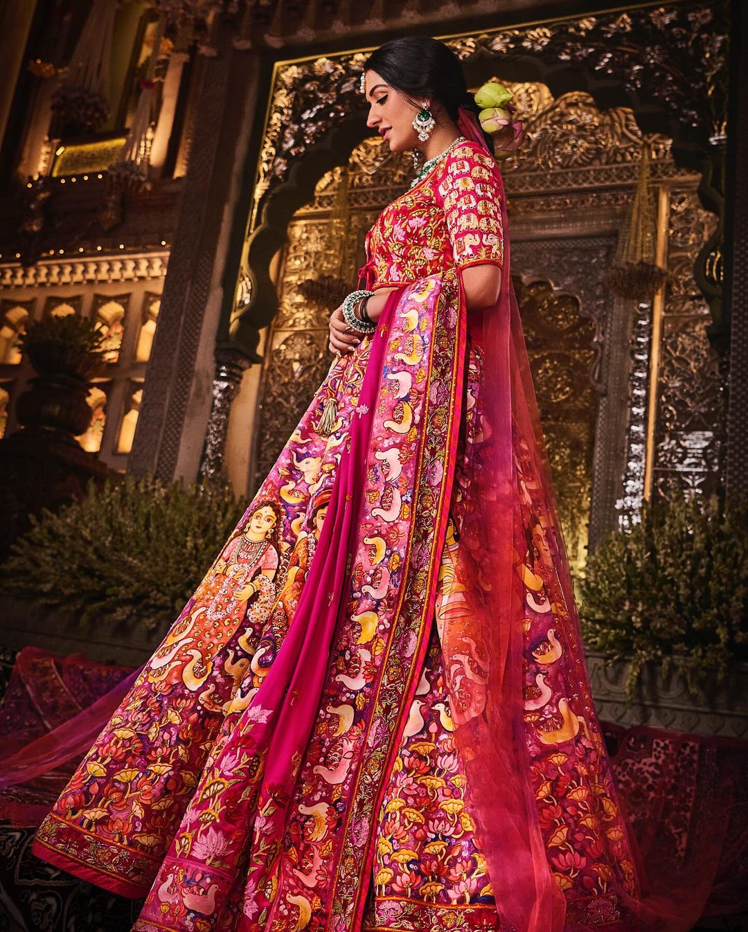 The human figures representing the happy couple radiate a celestial aura that honours the divinity in their humanity. The fauna depicts Anant’s fondness for animals, particularly elephants that are considered auspicious and beautiful. (Instagram/Rhea Kapoor) Radhika Merchant for Shubh Aashirwad