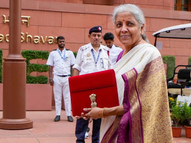 Union finance minister Nirmala Sitharaman with a red pouch carrying the Budget documents on July 23. (Image: PTI/Atul Yadav)