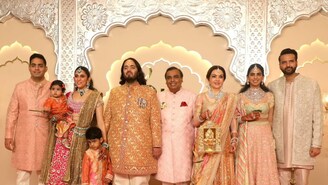The entire Ambani family poses for a family picture before Anant's baraat heads out. (Image: AP) The entire Ambani family poses for a family picture before Anant's baraat heads out. (Image: AP)