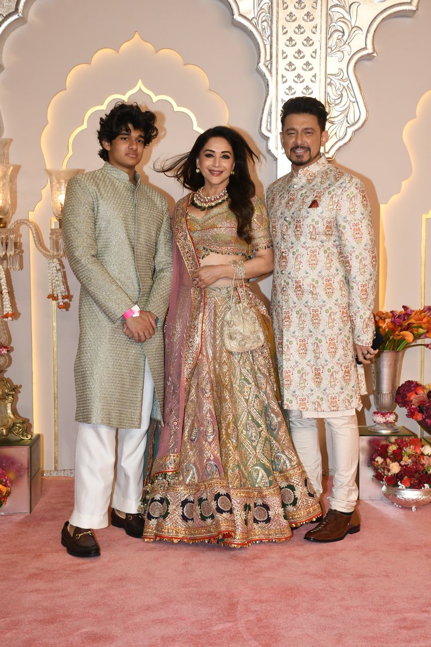 Madhuri Dixit Nene looks regal as she poses with family at Anant and Radhika's wedding event. (Image: Viral Bhayani) Madhuri Dixit Nene looks regal as she poses with family at Anant and Radhika's wedding event. (Image: Viral Bhayani)