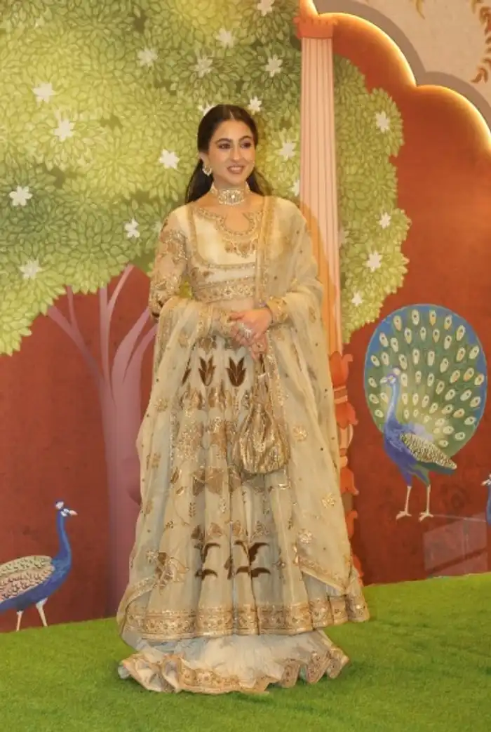 green emerald velvet dress Sara Ali Khan in our Black Antique Gold Embroidered Lehenga Set – Manish  Malhotra main image 1
