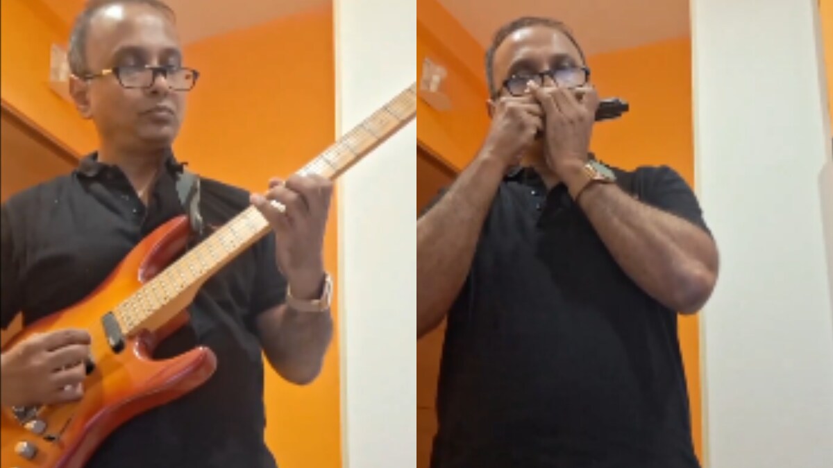 Man Plays National Anthem On Guitar Harmonica To Celebrate