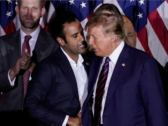 Vivek Ramaswamy greets Donald Trump on stage during a New Hampshire presidential primary election night watch party, in Nashua, New Hampshire, U.S., January 23, 2024. (Reuters)