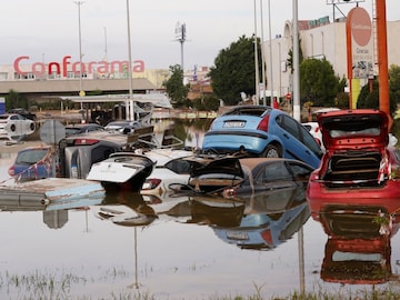 Several cars were swept away by the devastating floods in Spain's Valencia region. (AP)