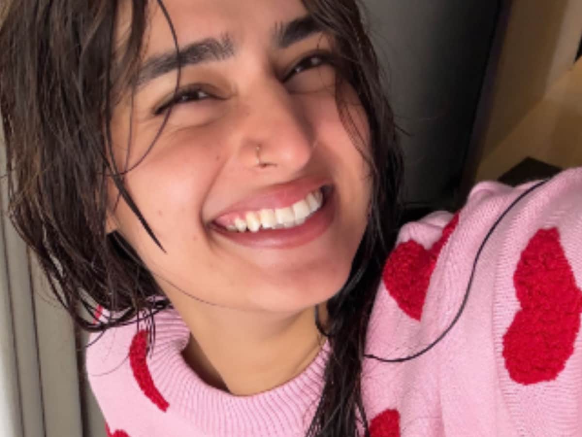 Her resilient gaze challenges the world