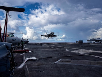 An F/A-18F Super Hornet from VFA-41 prepares for an arrested landing on the USS Abraham Lincoln in the Pacific Ocean on August 10, 2024. (Reuters)