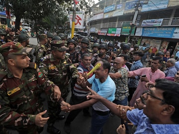 Bangladesh Hindus participating in a rally to demand that an interim govt withdraw all cases against their leaders and protect them from attacks and harassment in Chattogram Nov. 1. (AP)