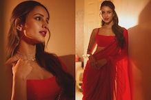 Triptii Dimri Sizzles In A Red Saree Adorned With Delicate Embellishments Triptii Dimri Sizzles In A Red Saree Adorned With Delicate Embellishments