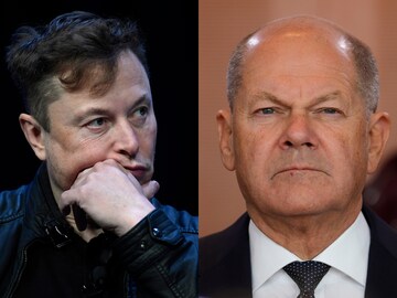  Elon Musk and German Chancellor Olaf Scholz (AP Image)