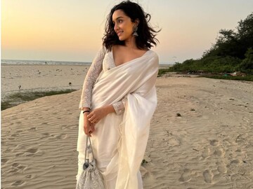 Shraddha Kapoor's Ivory Saree With A Silver Potli Dishes Out Ultimate Fashion Inspiration For Beach Wedding Look - News18