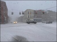 Fresh snow and high winds hit New York as stormy weather engulfed northeast US. (AP) Fresh snow and high winds hit New York as stormy weather engulfed northeast US. (AP)