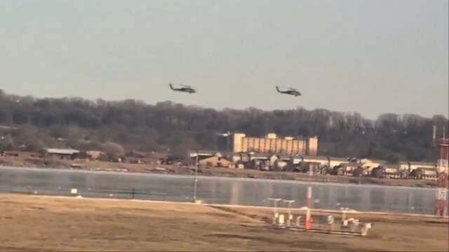 Video screengrab shows helicopters flying close to a departing plane at Reagan Airport (Social Media)