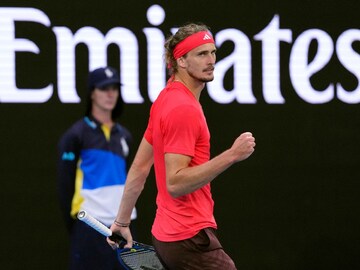 Alexander Zverev of Germany celebrates after defeating Ugo Humbert of France in a fourth round match at the Australian Open tennis championship in Melbourne, Australia, Sunday, Jan. 19, 2025. (AP Photo/Vincent Thian)   