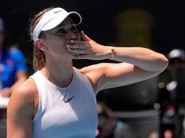 Paula Badosa celebrates after defeating Coco Gauff during their quarterfinal match at the Australian Open. (AP Photo)
