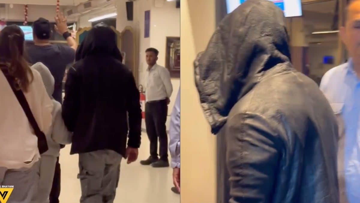 Shah Rukh Khan Hides His Look Under Hoodie As He Returns From Jamnagar New Year Celebration | Watch Shah Rukh Khan Hides His Look Under Hoodie As He Returns From Jamnagar New Year Celebration | Watch