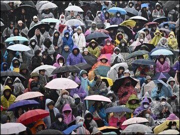 Supporters of impeached South Korea president Yoon Suk Yeol take part in a rally near his residence. (AFP)