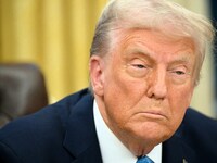 US President Donald Trump speaks to the press after signing an executive order in the Oval Office of the White House in Washington, DC. (IMAGE: AFP)