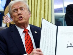 US President Donald Trump holds a signed executive order on tariffs on aluminum imports in the Oval Office of the White House in Washington, US. (IMAGE: REUTERS) US President Donald Trump holds a signed executive order on tariffs on aluminum imports in the Oval Office of the White House in Washington, US. (IMAGE: REUTERS)