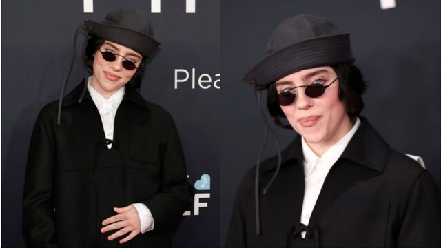The singer paired her Prada jacket with a crisp white shirt and navy trousers. 