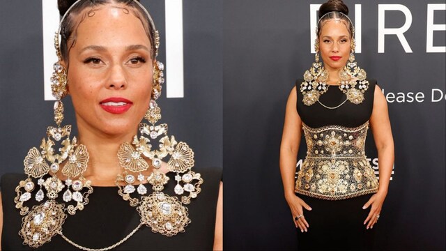 Alicia Keys paired her dress with dramatic gold earrings. 