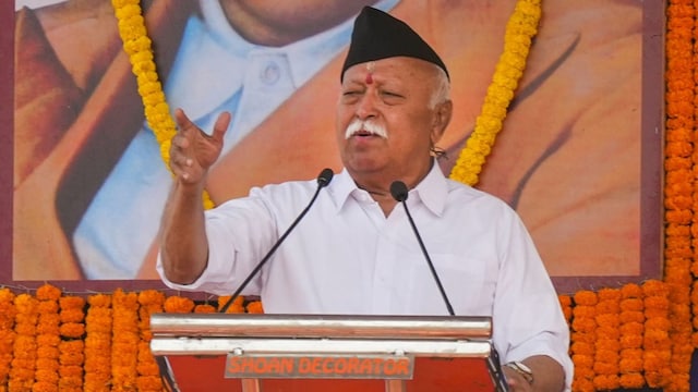 RSS chief Mohan Bhagwat addresses a public meeting at Talit SAI Complex in east Bardhaman, West Bengal, on Sunday. (PTI)