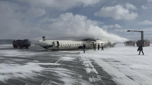 Delta Plane Crash Survivor Captures Passengers Fleeing Overturned