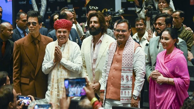 Rajasthan CM Bhajan Lal Sharma, Deputy CM Diya Kumari with Bollywood stars Kartik Aryan and Karan Johar during the IIFA Awards, in Jaipur, Saturday, March 8, 2025. (PTI Photo) 